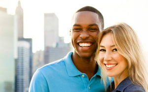 interracial couple laughing on a date