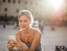 young woman using the best dating app for iPhone